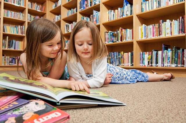Two Friends Exploring a Storybook